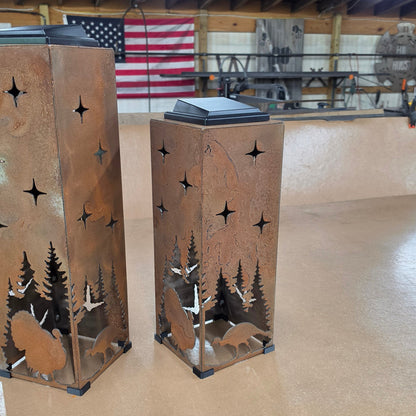 16in rustic metal turkey themed solar pillar in a shop