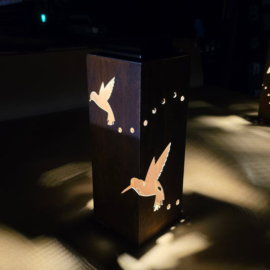 Hummingbird rustic metal solar pillar lantern luminary