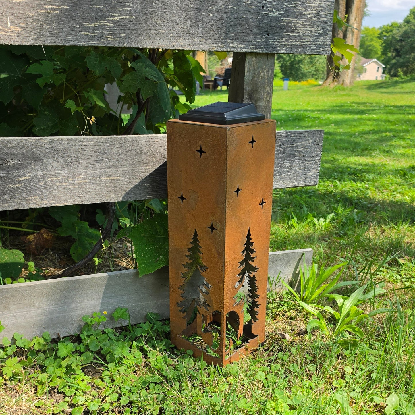 20in Rustic Metal Bear themed Solar Pillar outdoors by Grape Vine