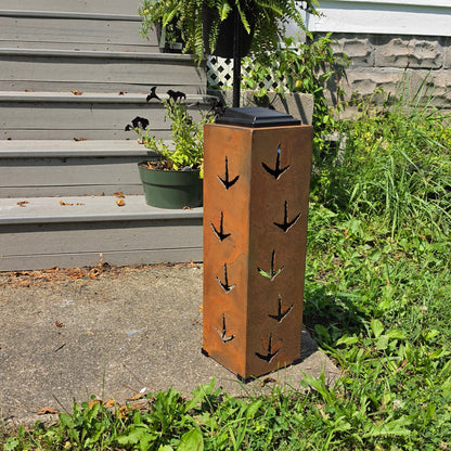 Rustic Turkey solar pillar on front patio showing turkey prints
