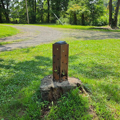 Rustic 20in turkey themed solar pillar outdoors on stump front facing