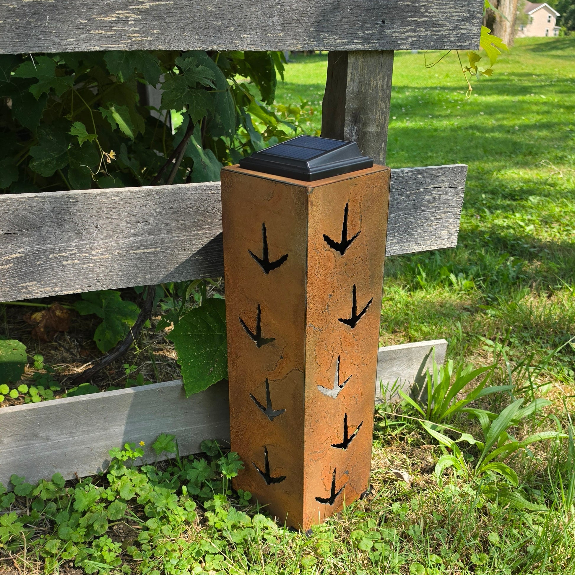 Rustic metal turkey solar pillar 20in tall outdoors rear facing