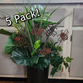 Potted plant with decorative metal bee stakes.