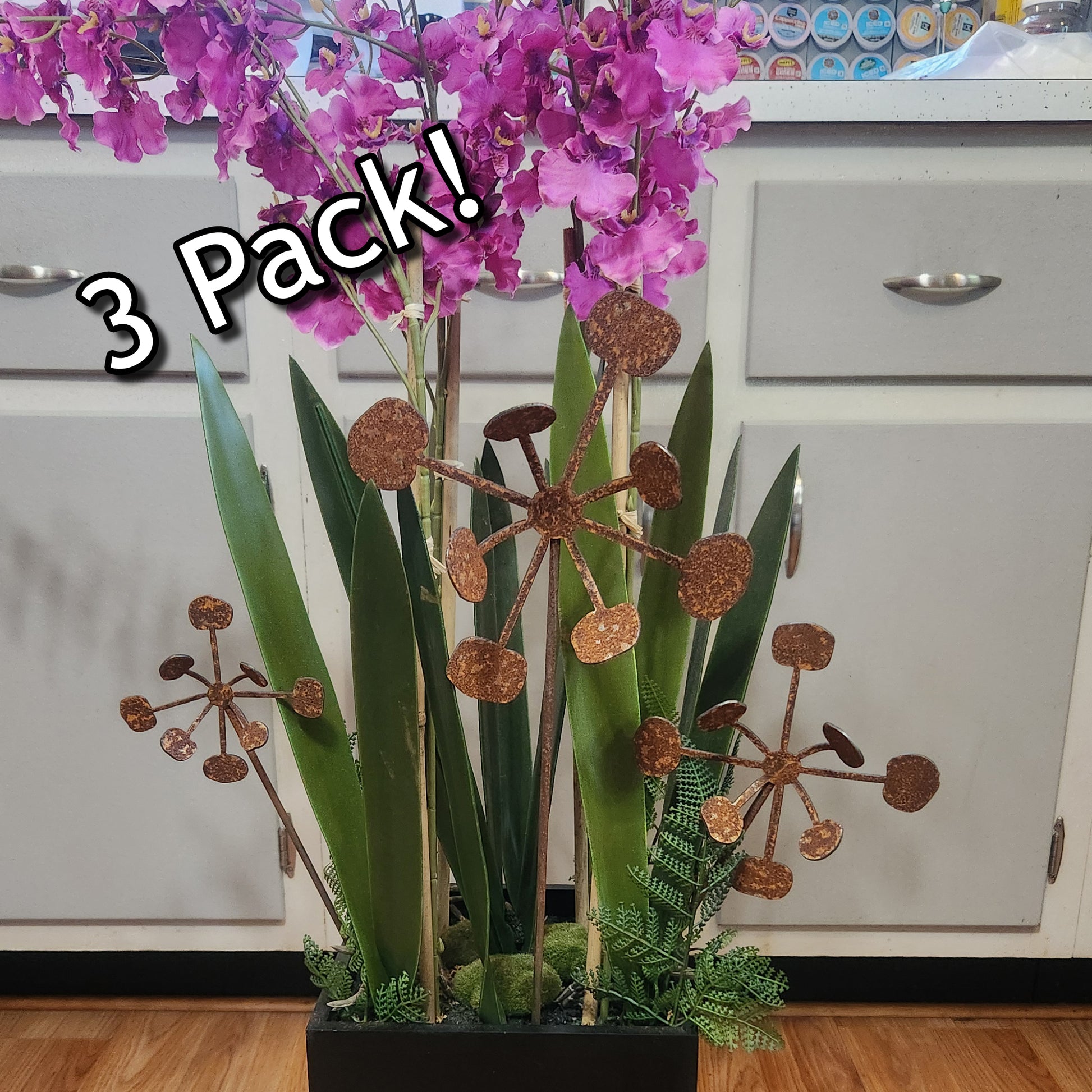 Rustic metal bendable dandelion flower stakes.
