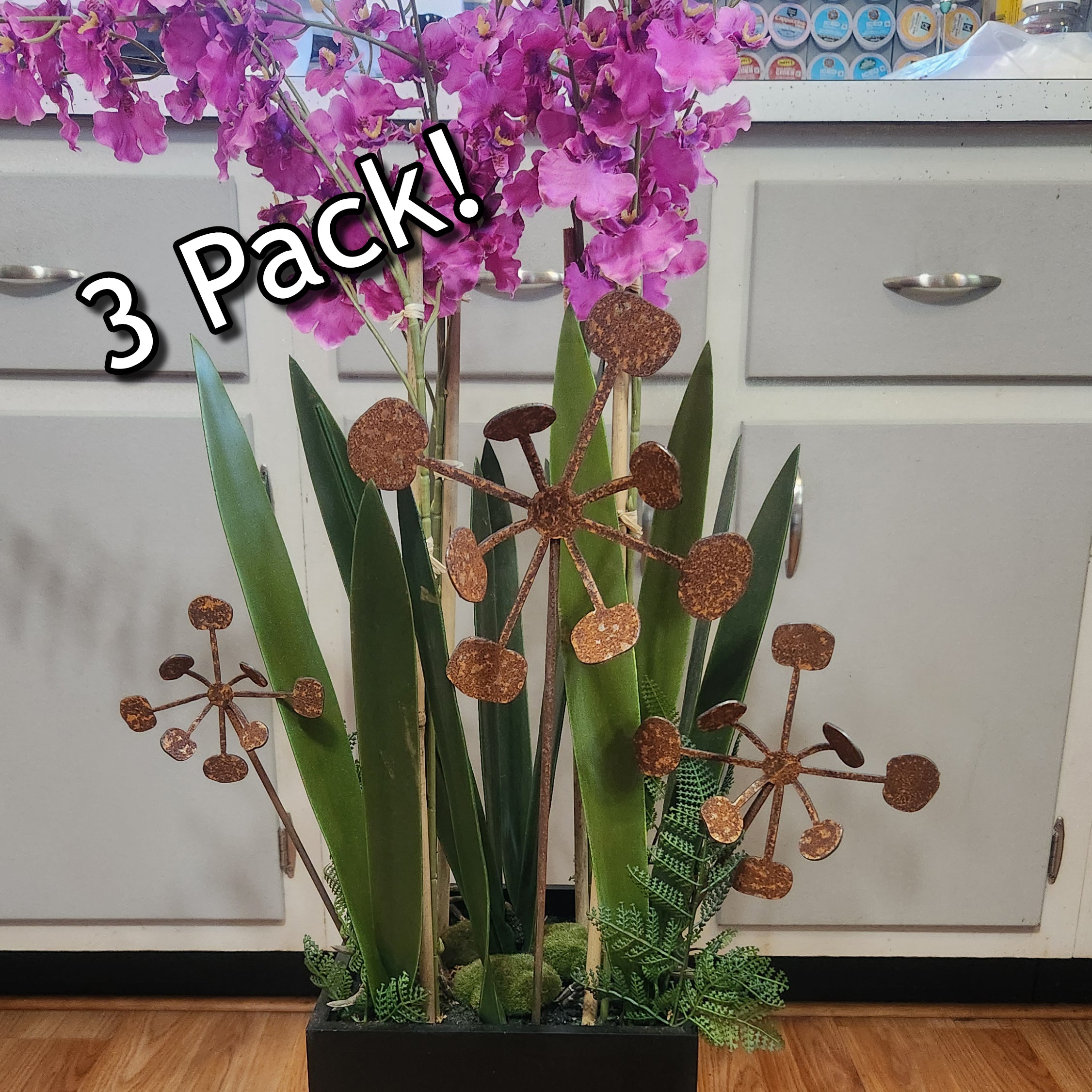 Rustic metal bendable dandelion flower stakes.