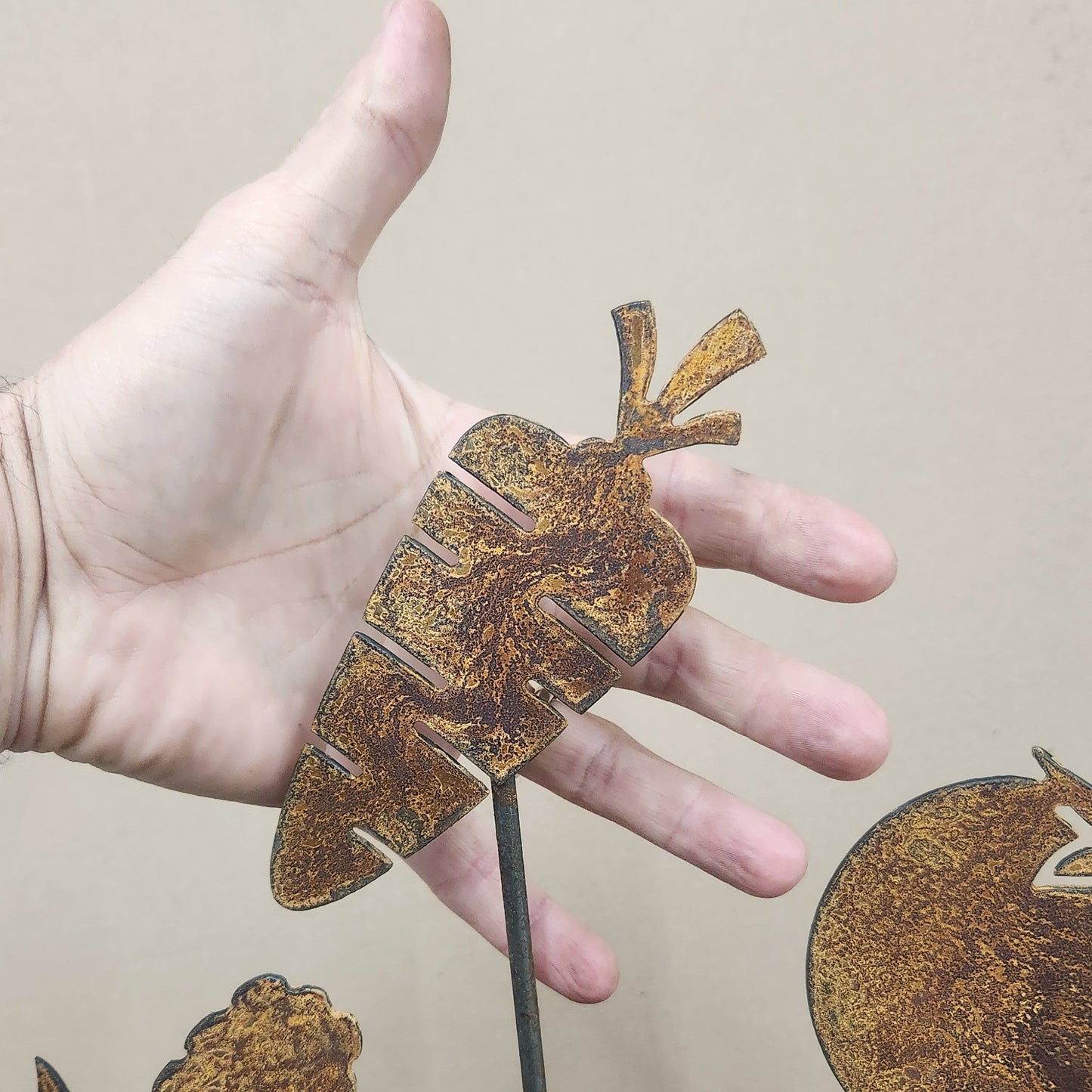 Carrot rustic metal garden stake size comparison