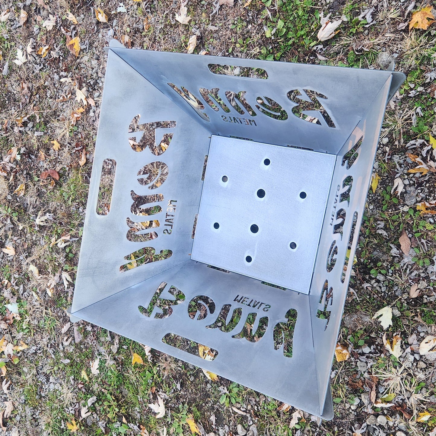 Custom name fire pit top view showing the bottom