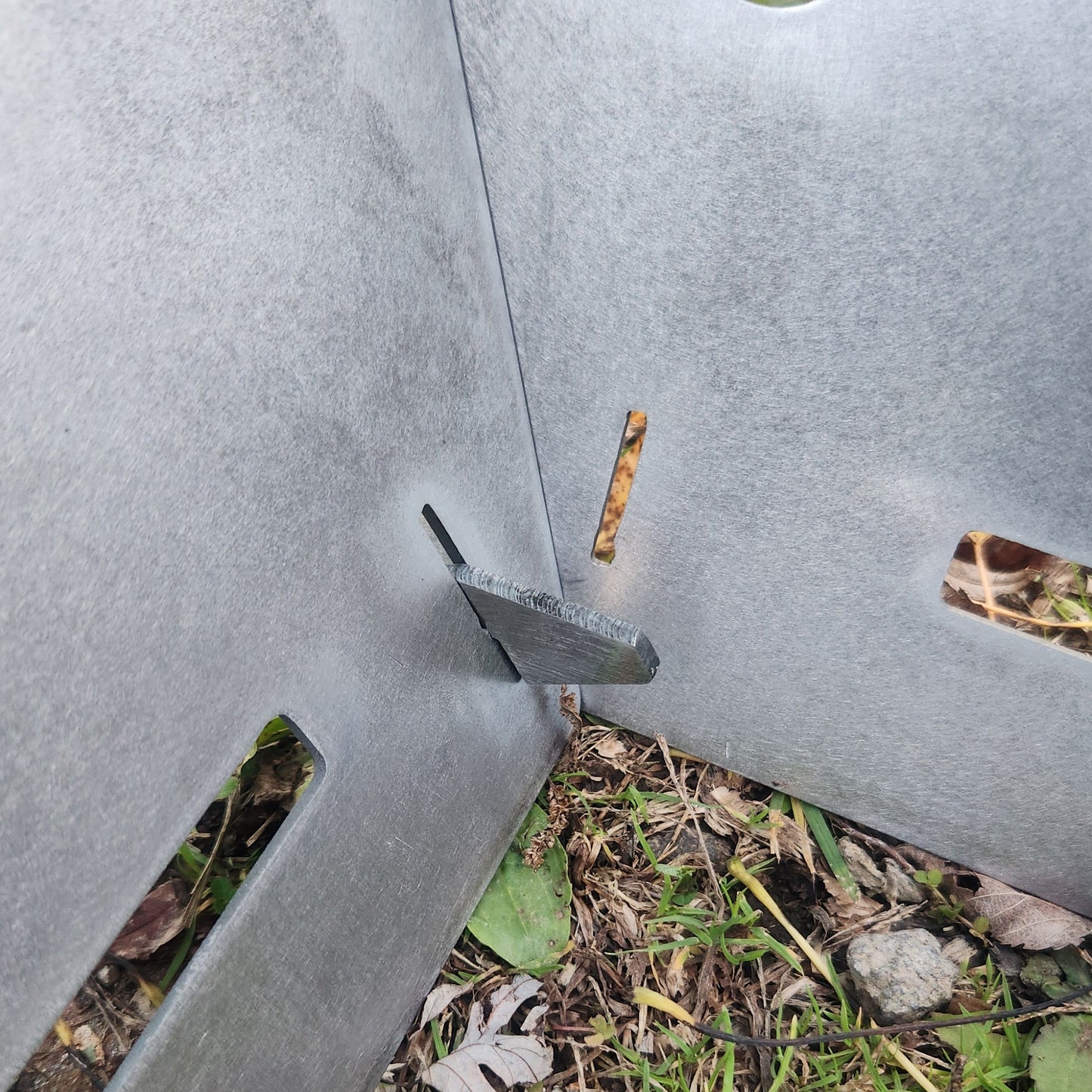 Custom name collapsable fire pit pin that holds in the bottom plate