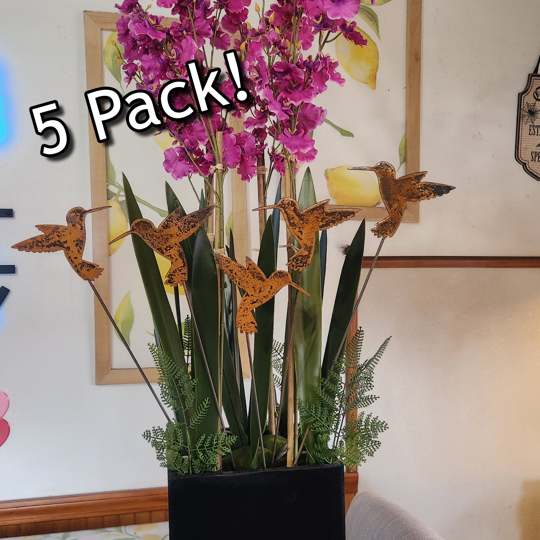 Rustic metal hummingbird 5 pack plant stakes.