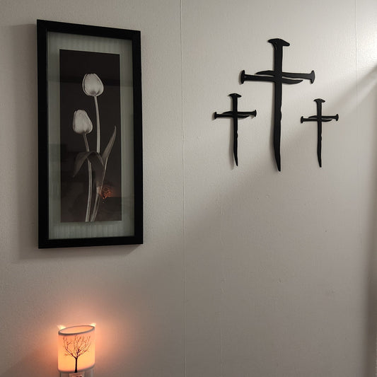 Heavy duty black steel crosses in the shape of nails