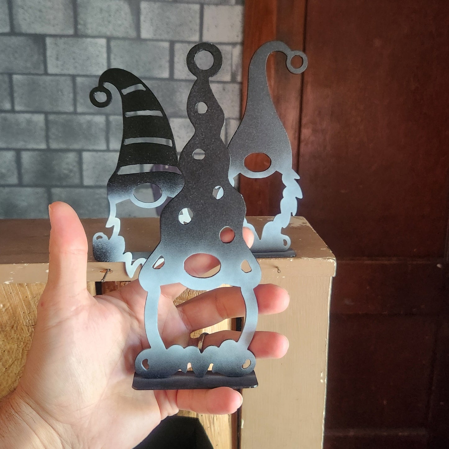 Metal gnome with a polka dot hat