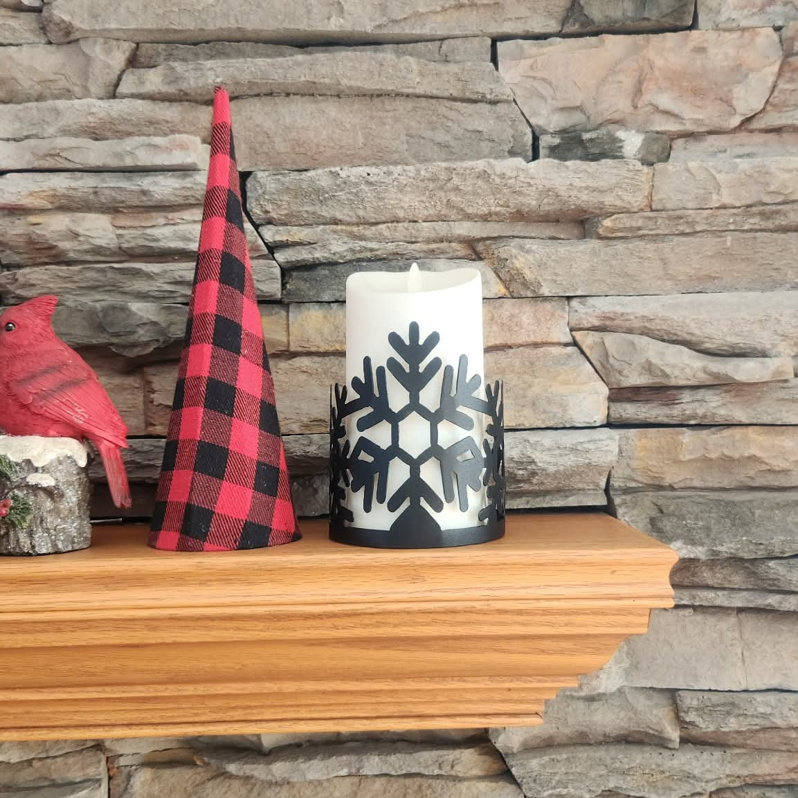 Snowflake candle wrap on mantle