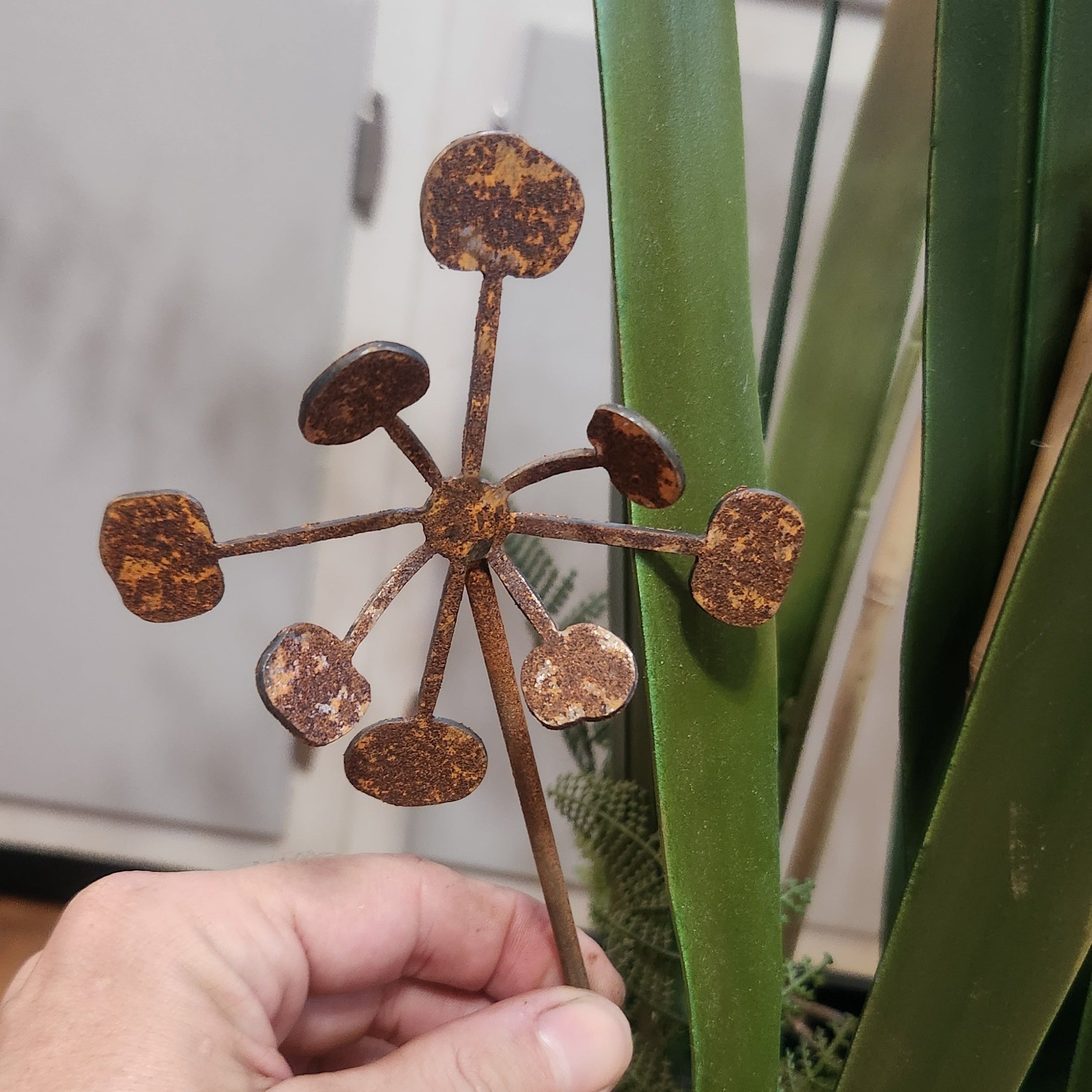 Rustic metal bendable dandelion front view to show detail.