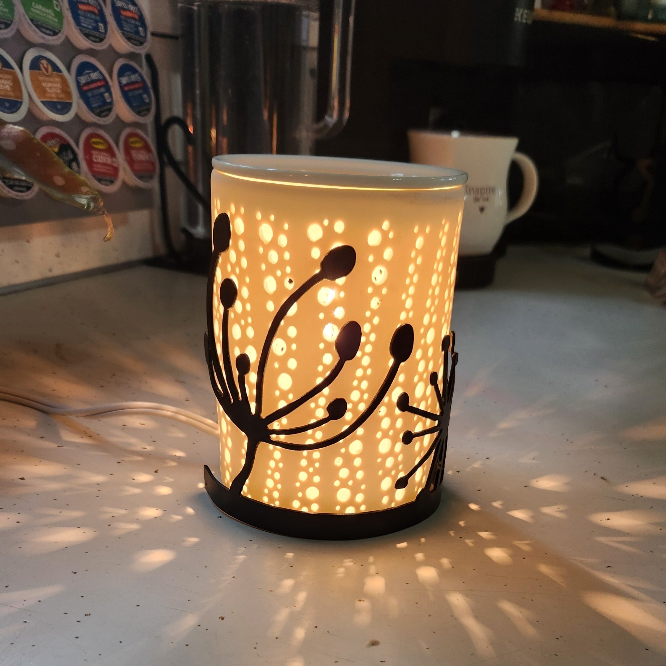 Dandelion candle wrap on a wax warmer