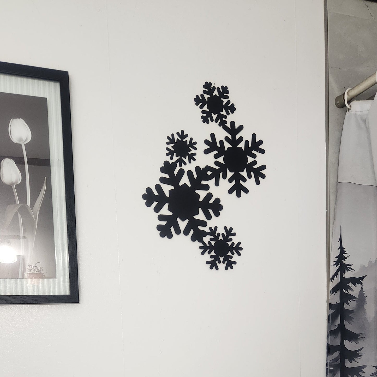 black painted falling snowflakes