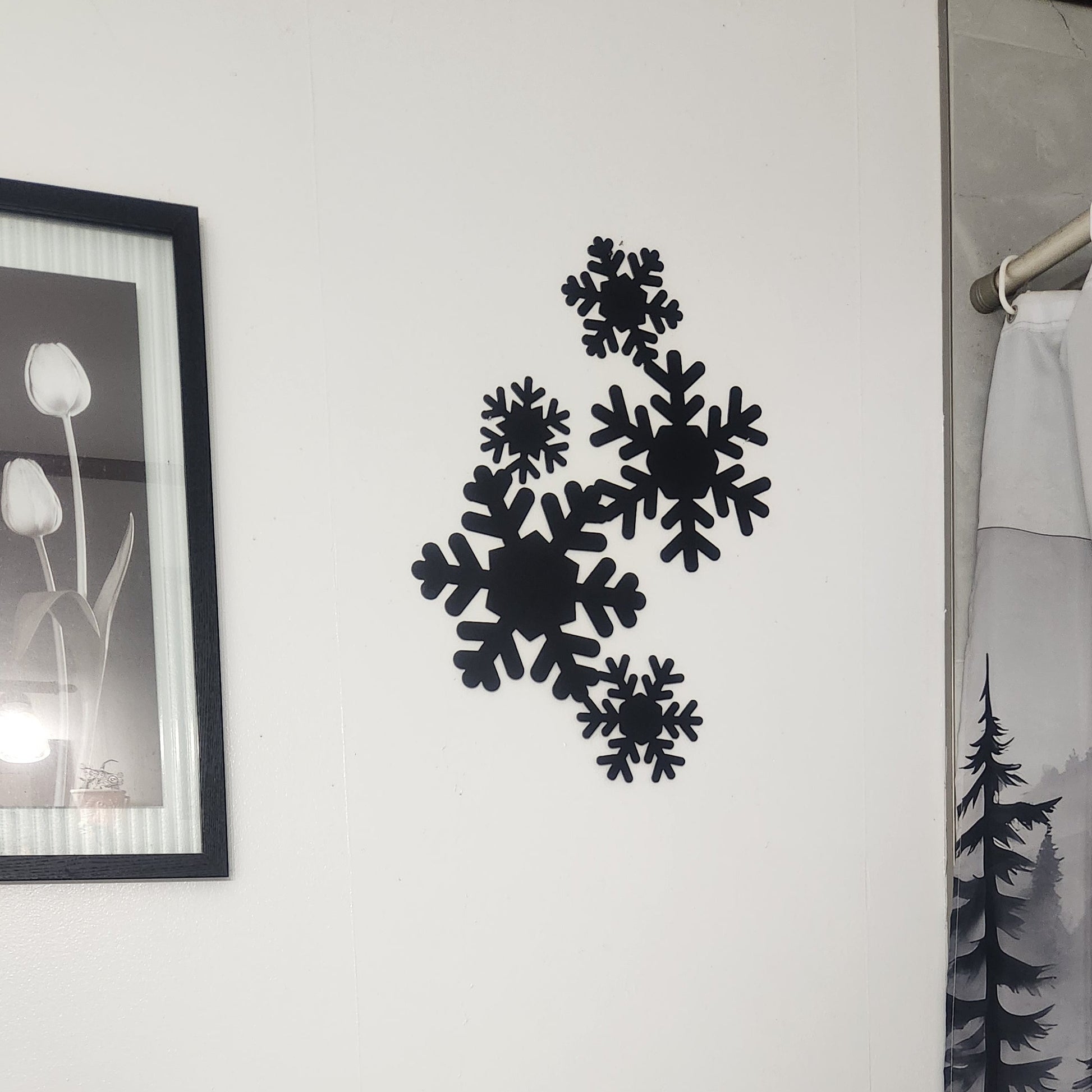 black painted falling snowflakes