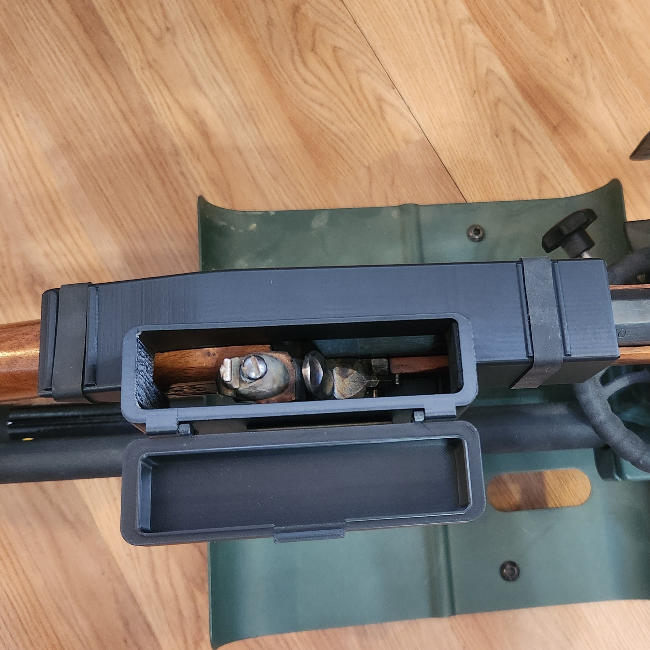 full top view of the flintlock rifle cover showing the action