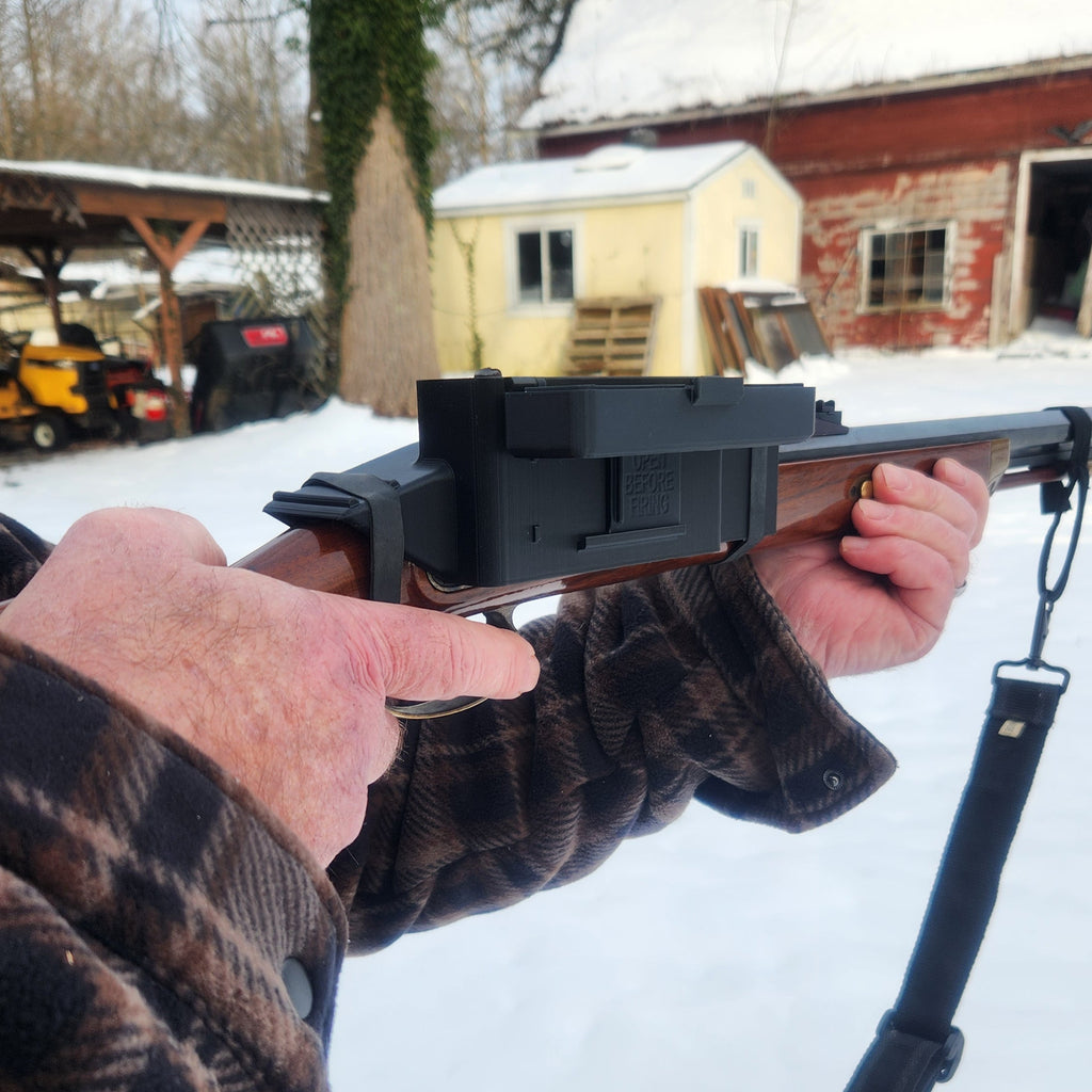 outdoor image of the flintlock gun cover being used with the lid open