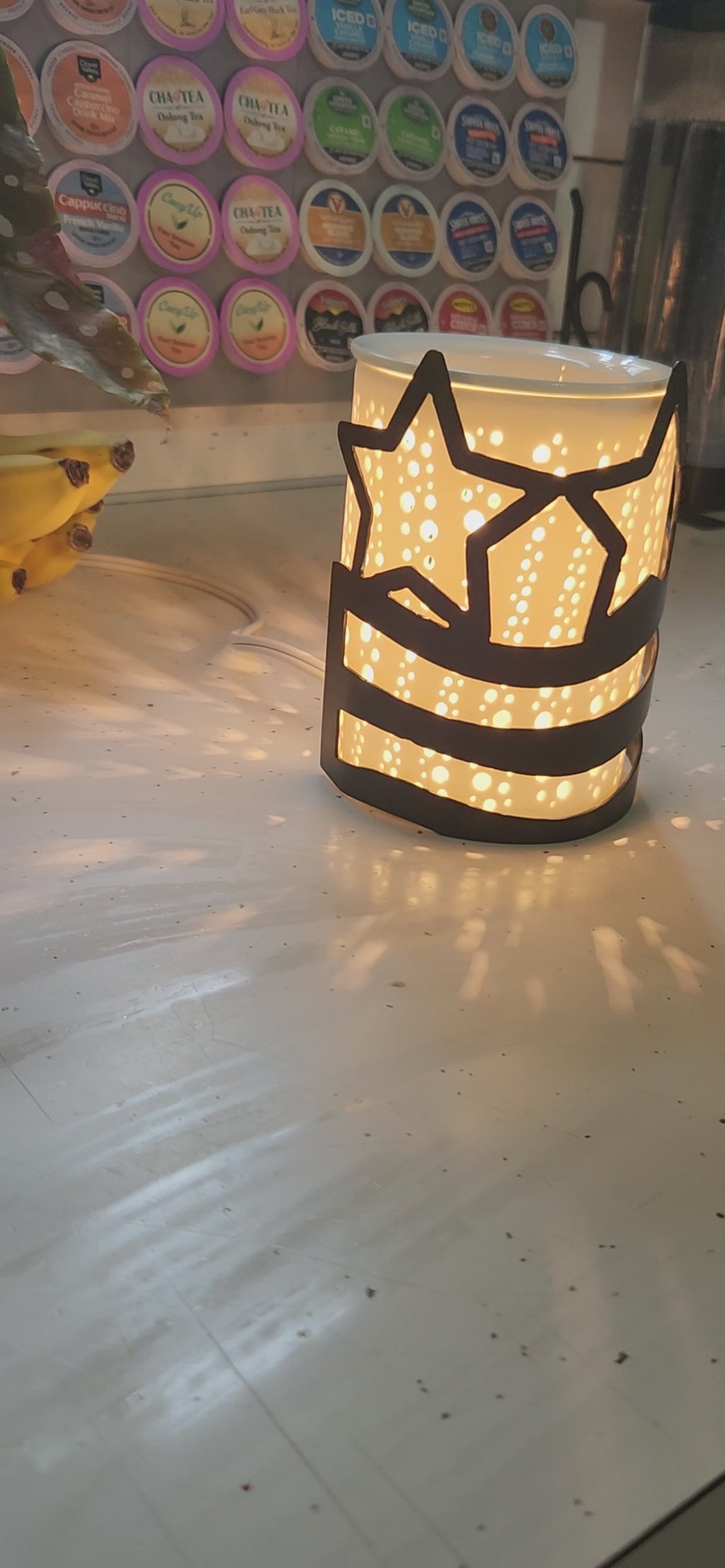 video of stars and stripes metal candle wrap on wax warmer