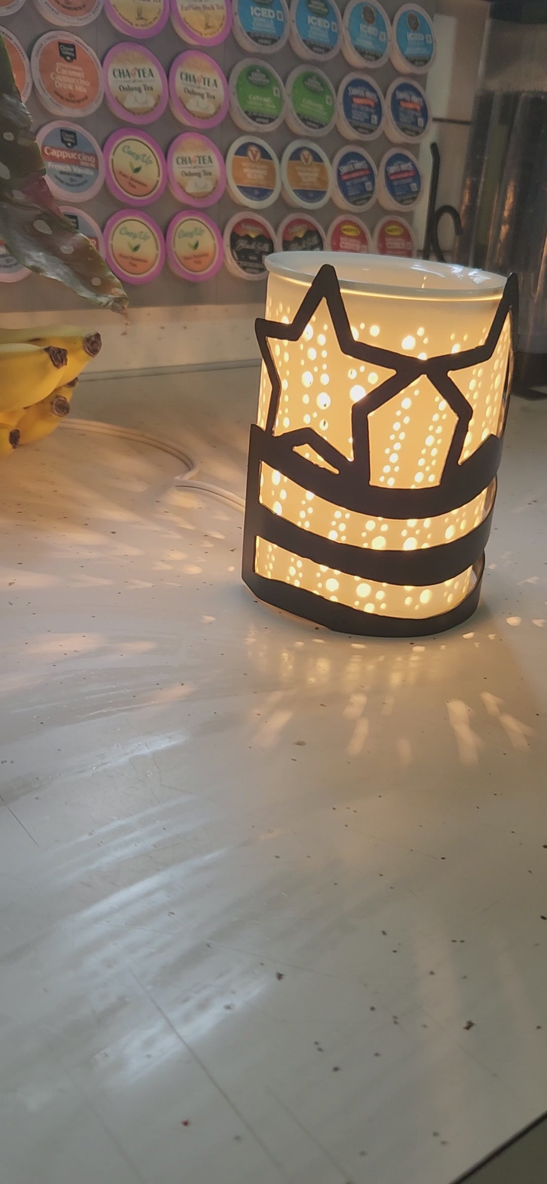 video of stars and stripes metal candle wrap on wax warmer