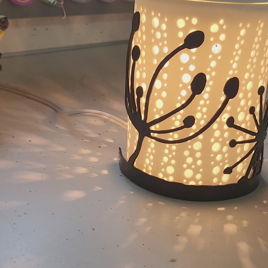 Video of dandelion candle wrap on a wax warmer