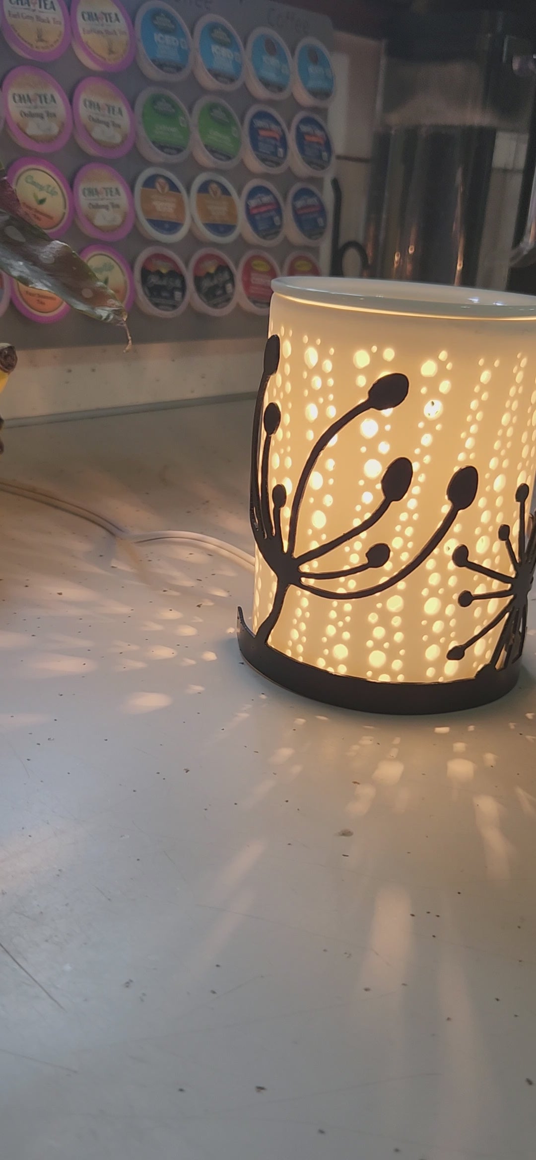Video of dandelion candle wrap on a wax warmer