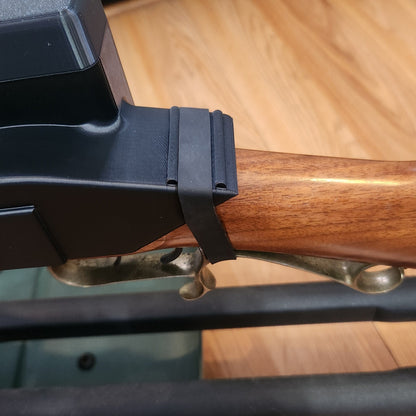close up of the rear rubber band positioning on the flint lock gun cover